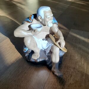 Handcrafted Ceramic Figurine - garden or plant mud man